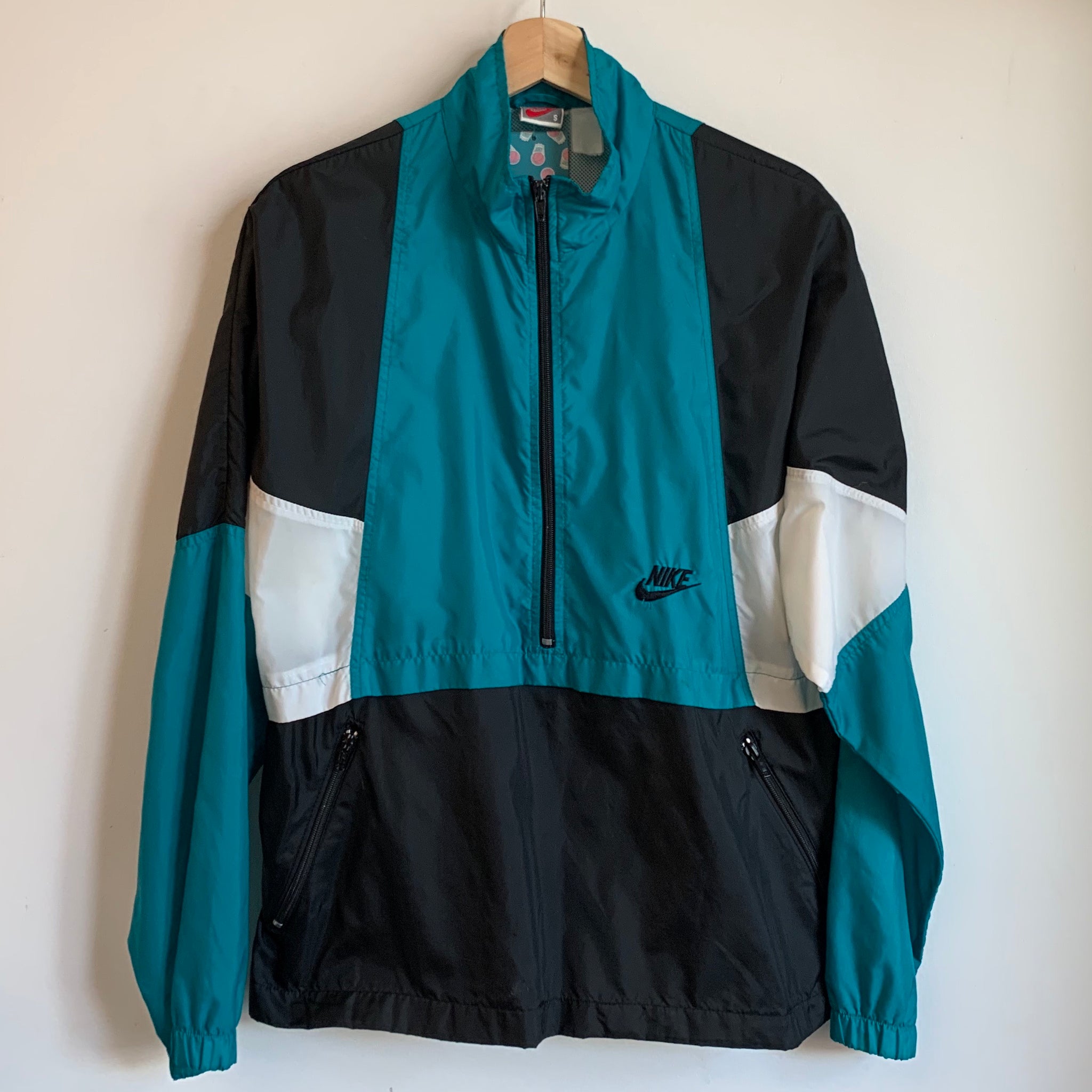 teal windbreaker nike