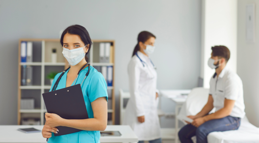 Nursing students with patient