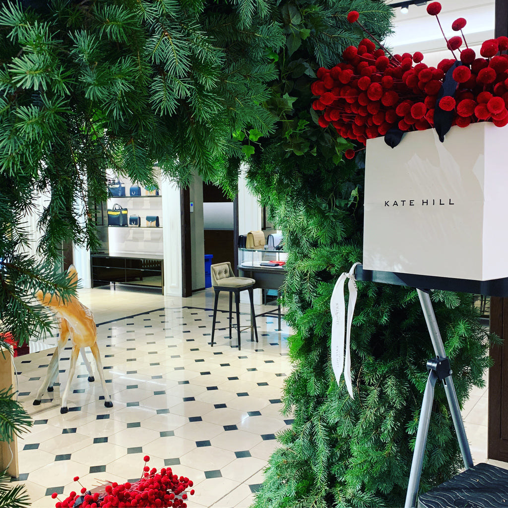 Setting up the Christmas wreath in the Burberry Melbourne store