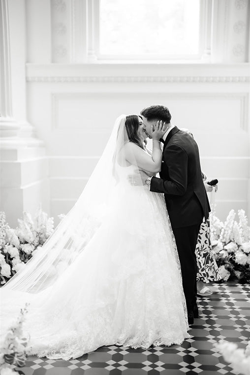 Bride and Groom kissing after wedding ceremony