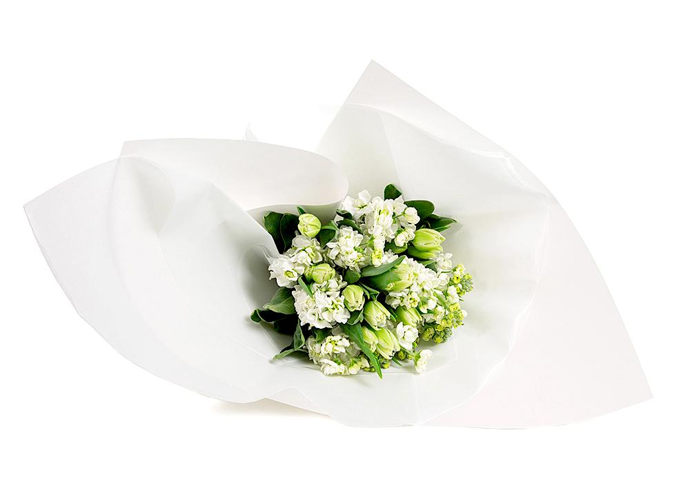 White Stock and Tulip Post gift wrapped in white paper for Mother's Day flower delivery
