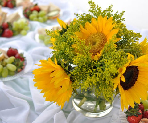 Sunflower centerpieces at a baby shower