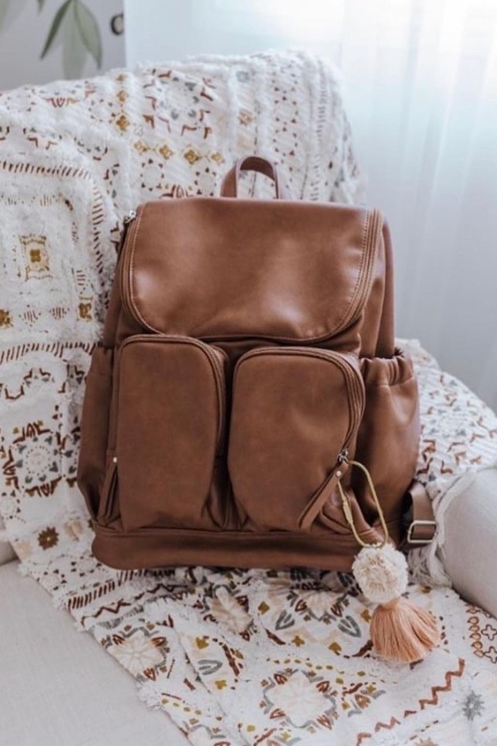 tan nappy backpack by oioi