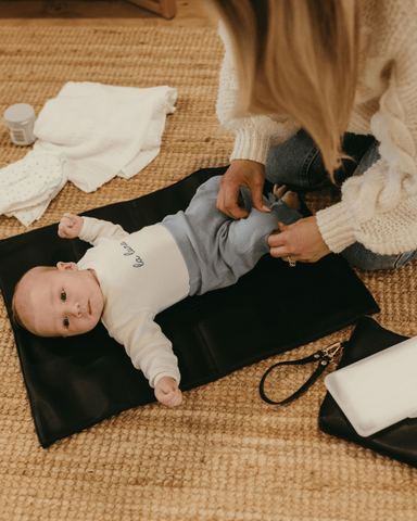 changing baby nappy on the go