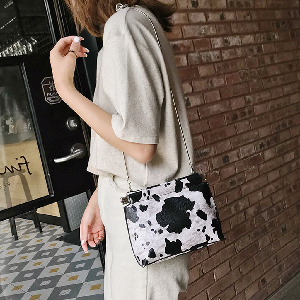 Cow print 2024 crossbody bag