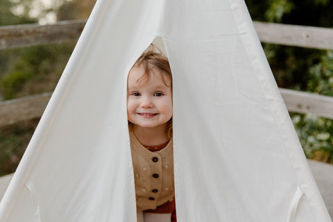 child-in-a-pyramid-tent