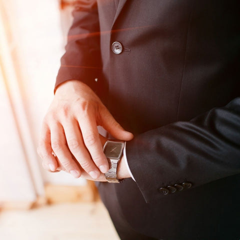 man checking his watch