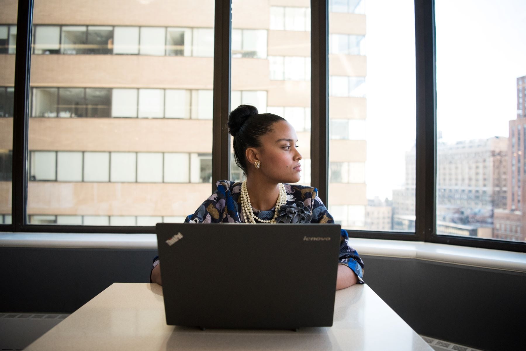 do i need a registered agent - businesswoman in conference room 