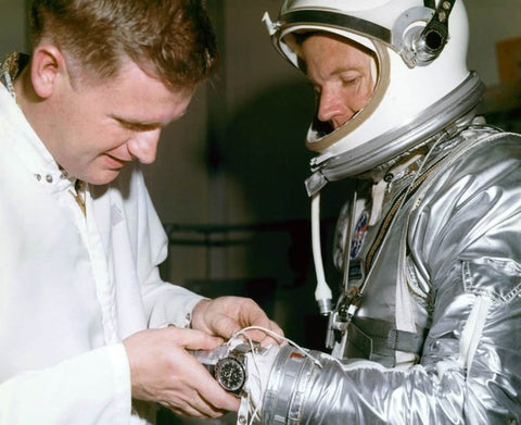Buzz Adrin preparing for the Historic launch with his Omega Speedmaster.