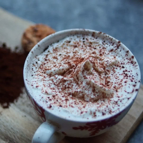 chocolate cappuccinoats in white mug