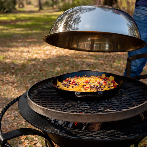 cook campfire nachos under grilling dome