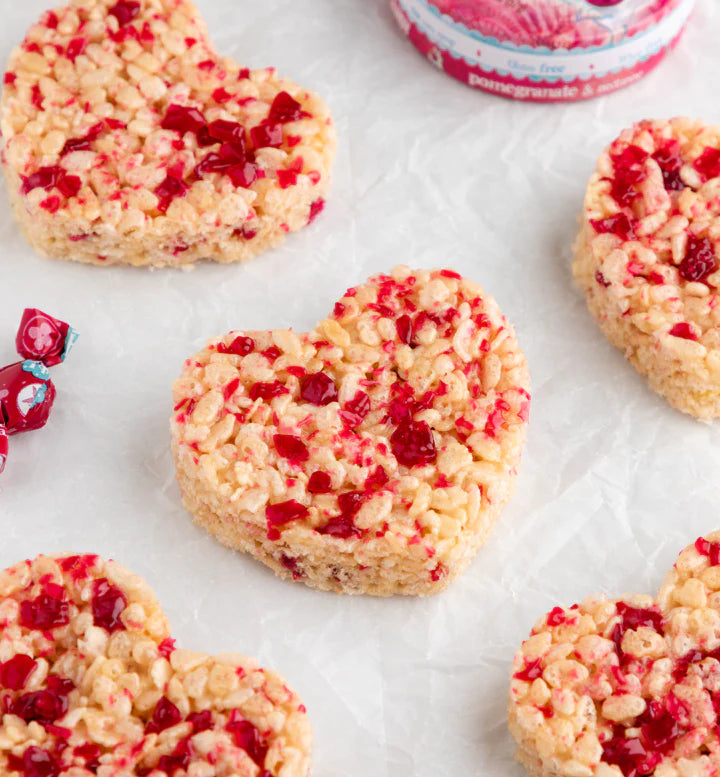 Heart shaped rice crispy treats topped with crushed Torie & Howard Hard Candies