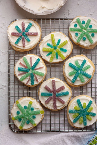 Snowflake cookies decorated with Sour Punch Arctic Straws candy