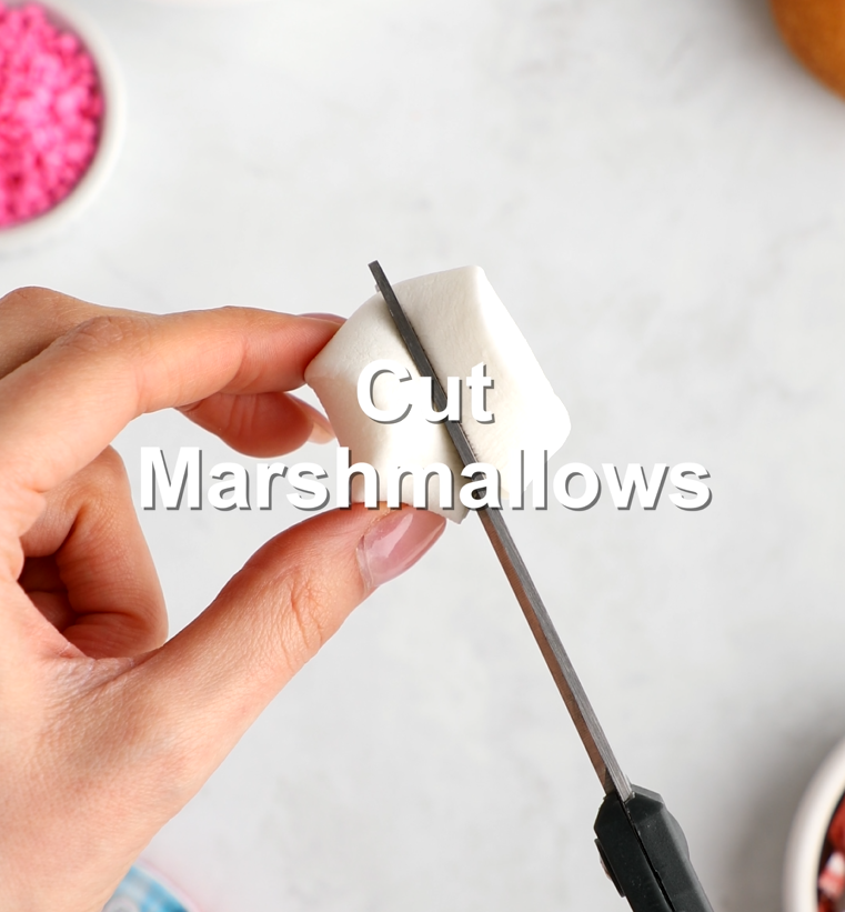 A marshmallow being cut in half
