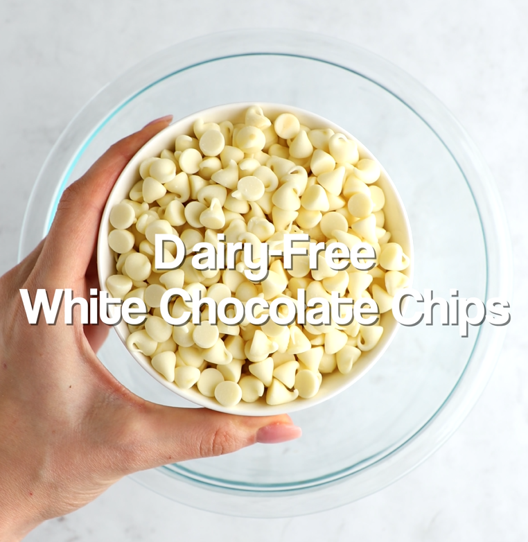 Adding white chocolate chips to a microwave-safe bowl