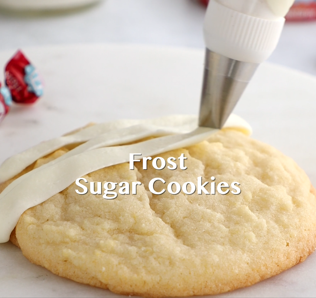 Sugar cookies being frosted