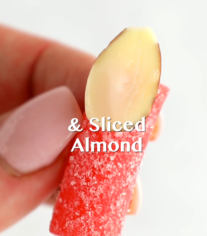 Sliced almond attached to the Sour Punch candy bite