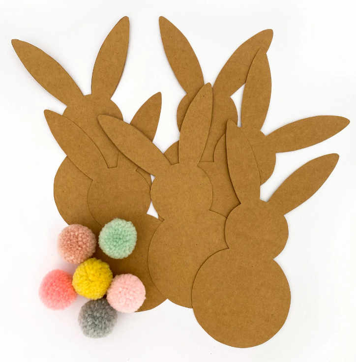 Cardboard bunnies with cotton ball tails