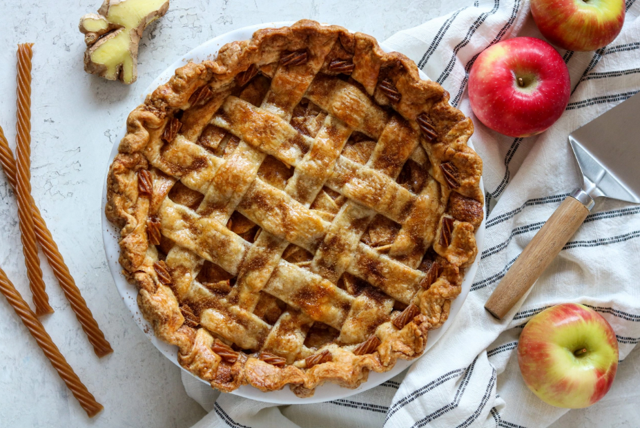 Completed Red Vines Apple Pie Recipe with Gingerbread Crust sitting on counter with Gingerbread Twists holiday candy