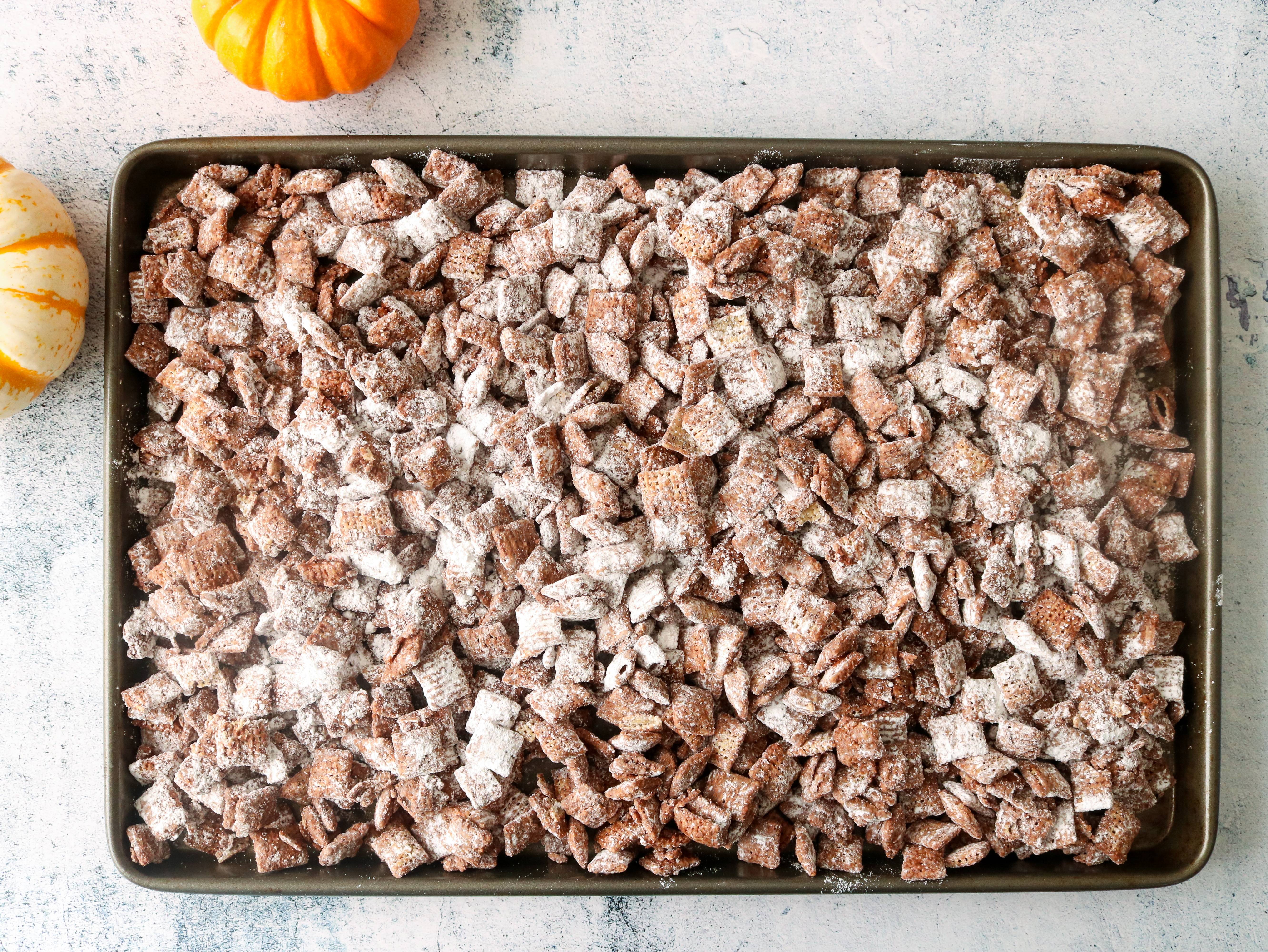 Chocolate covered chex coated in powdered sugar