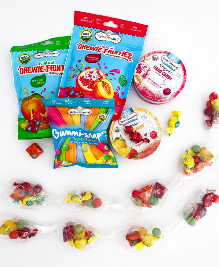 Candy items and candy separated into small sections within the clear foil
