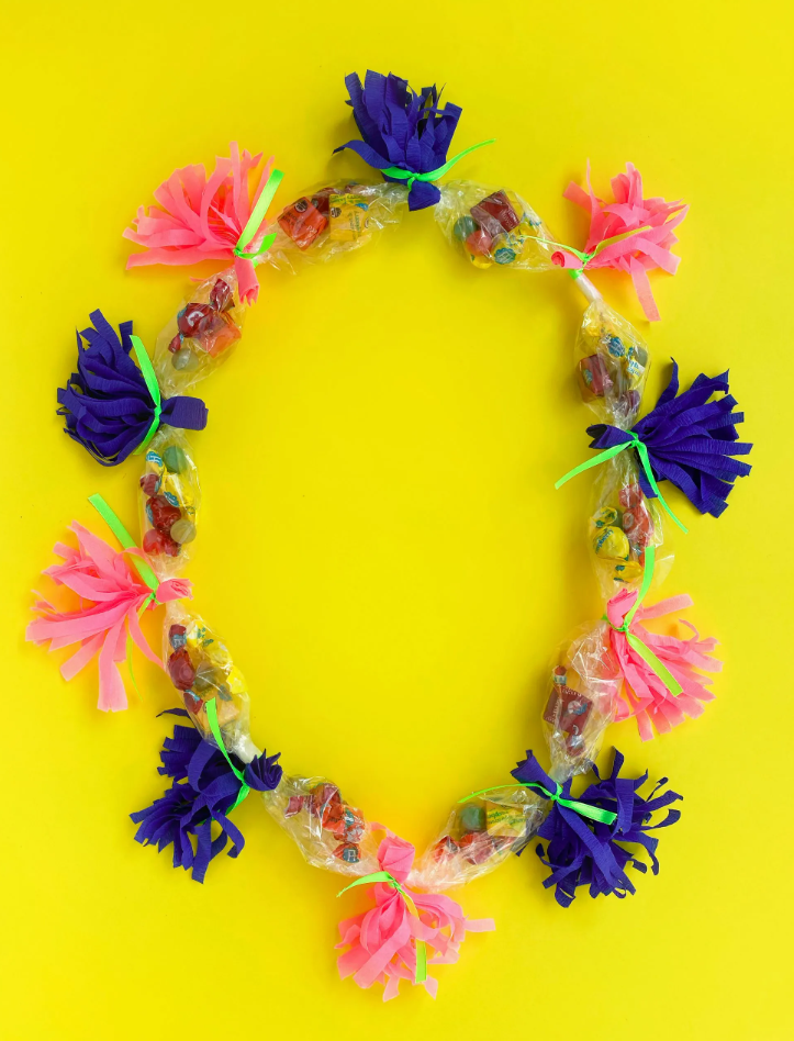 Completed lei on yellow background