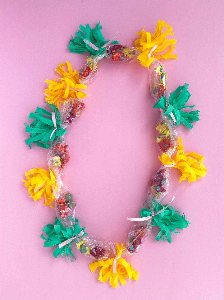 Completed lei on pink background