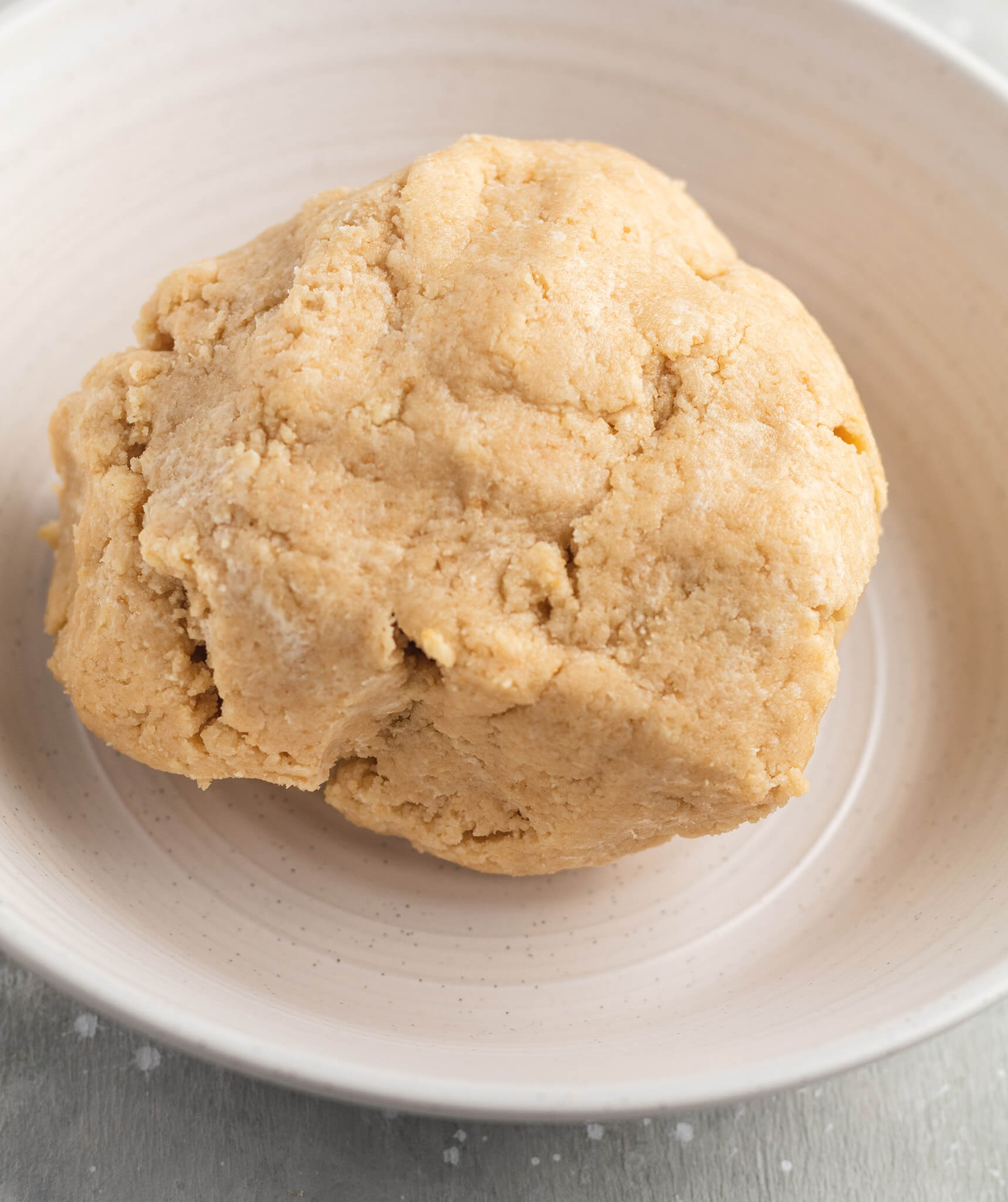 Formable ball of cookie crumbs and cream cheese dough