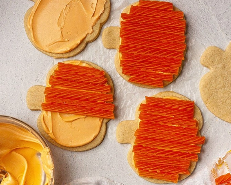 Pumpkin cookies decorated with Red Vines