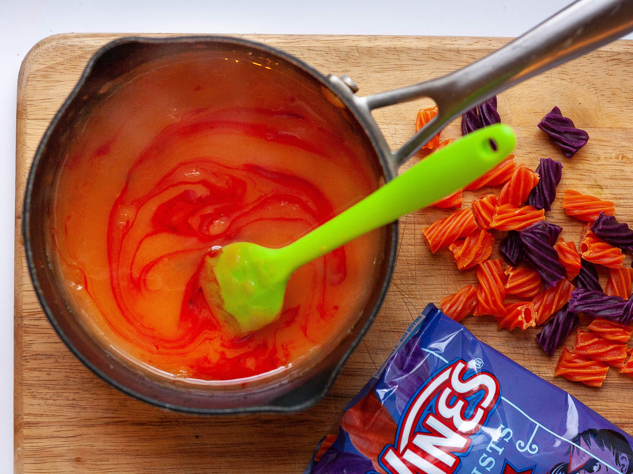 Red Vines cut into half inch pieces and melted in a pot