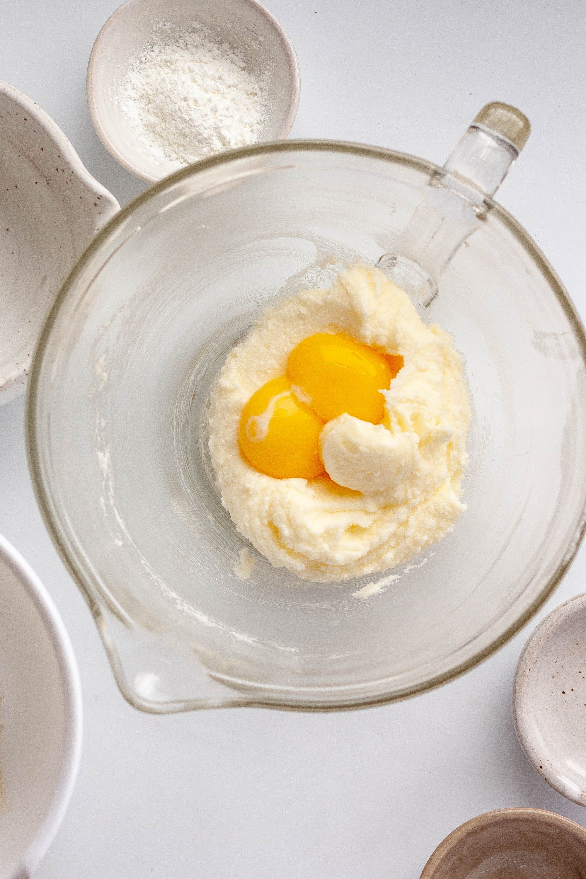 Egg yolk and vanilla added to sugar cookie mixture