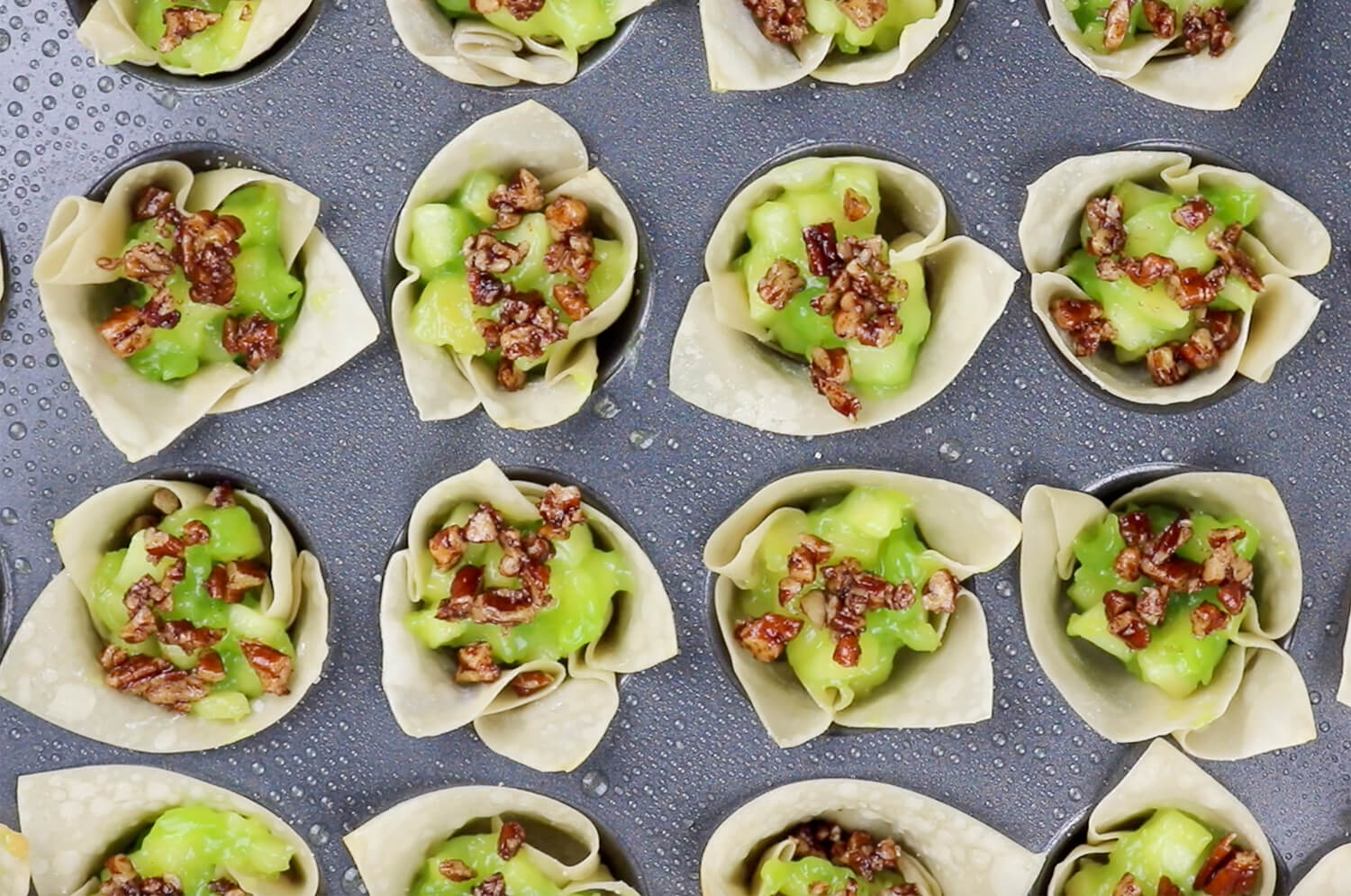 Apple Sour Punch, pecans, and cinnamon sugar in wonton wrappers