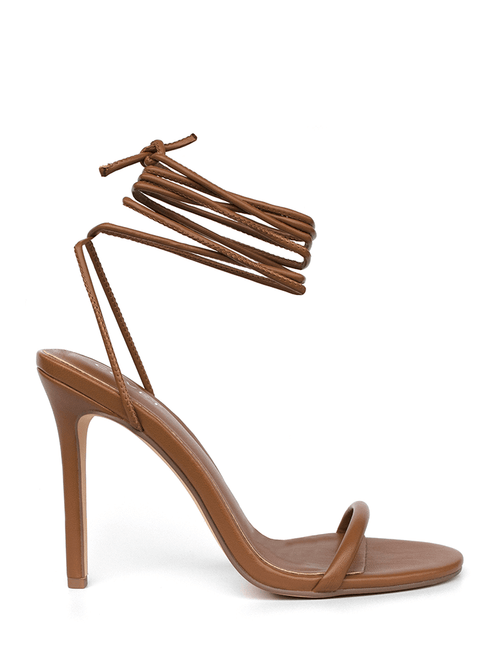 The Miller Affect wearing tan lace up heels - The Miller Affect