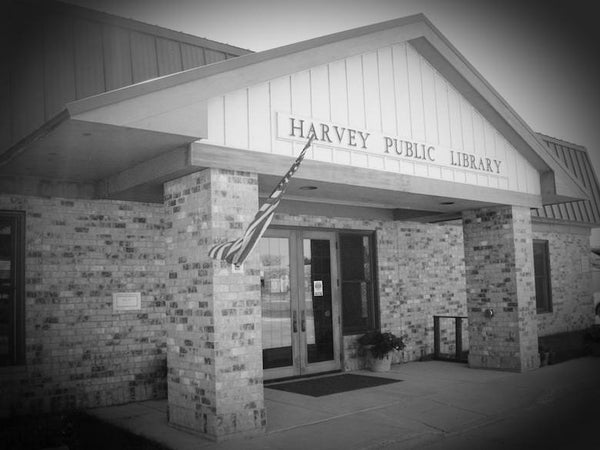 front of the harvey public library building 
