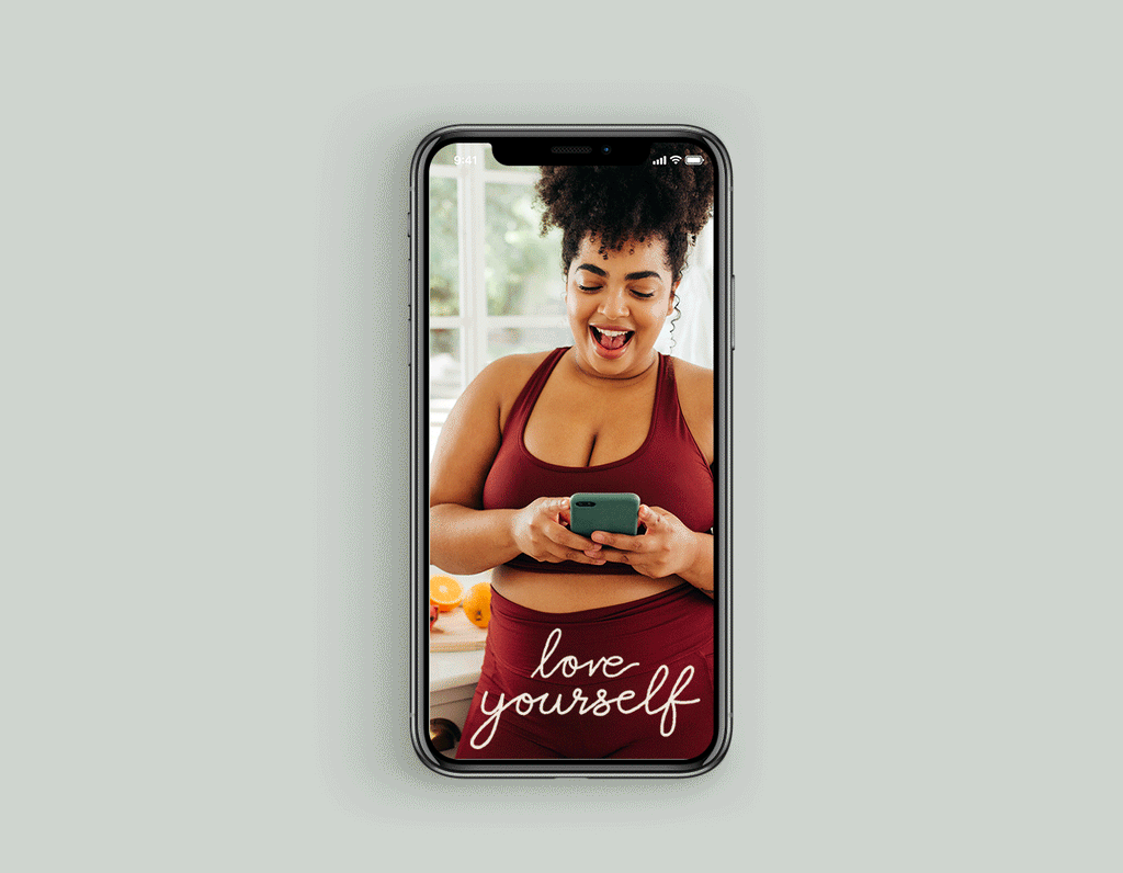 Smartphone image of a curvy woman wearing workout clothes and looking gleefully at her phone, with a GIF reading “love yourself”