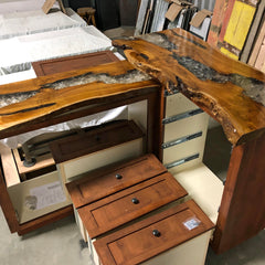 custom corner cabinet for Barbacoa Restaurant made from natural edge teak slabs with clear cracked resin