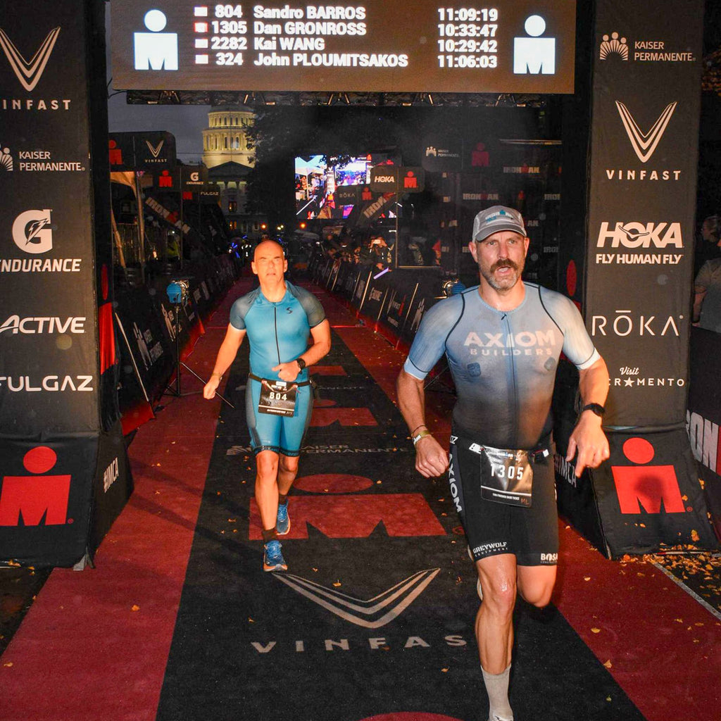 Dan crosses the ironman finish line