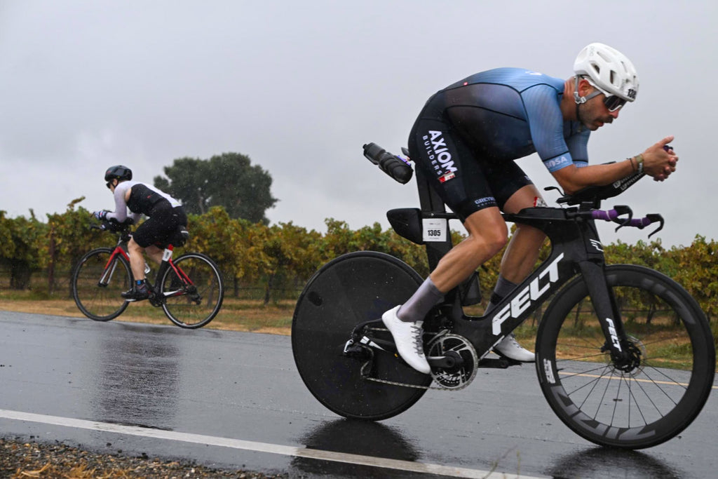 Dan Gronross rides his felt Triathlon bike in the rain