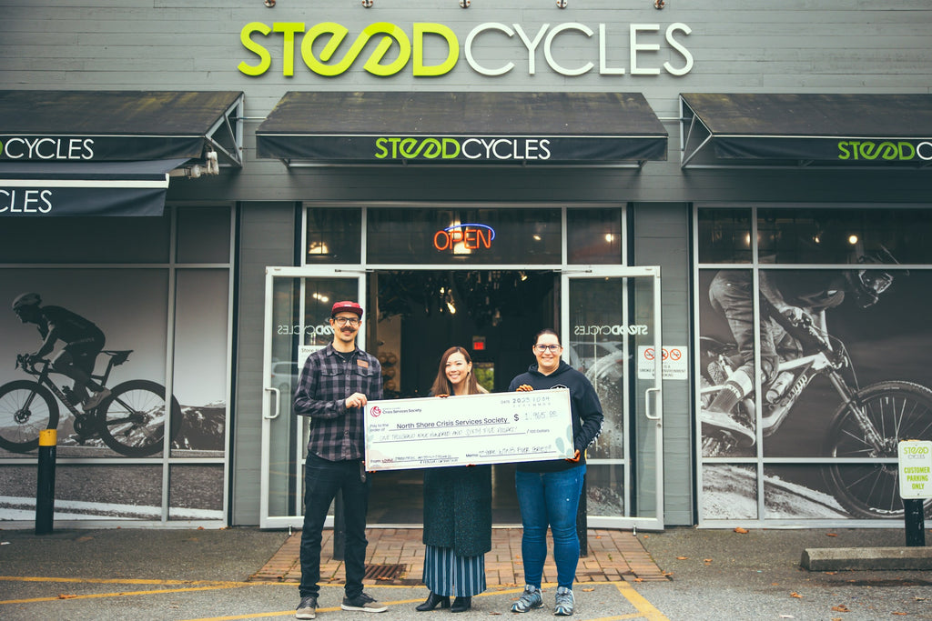 Sam from Steed, Deanne from NSMBA and Sandra from NSCSS hold up a giant cheque