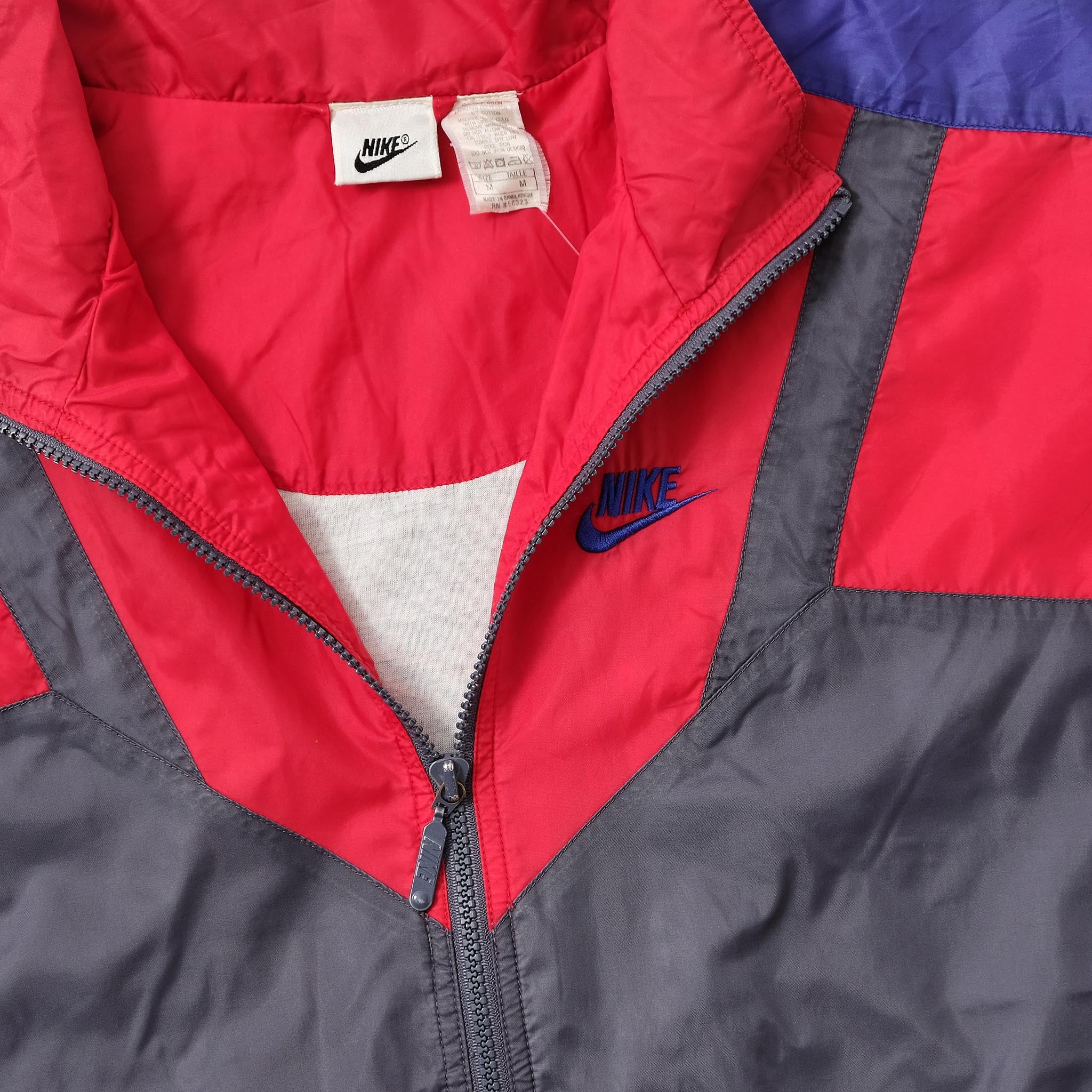 red and blue nike windrunner