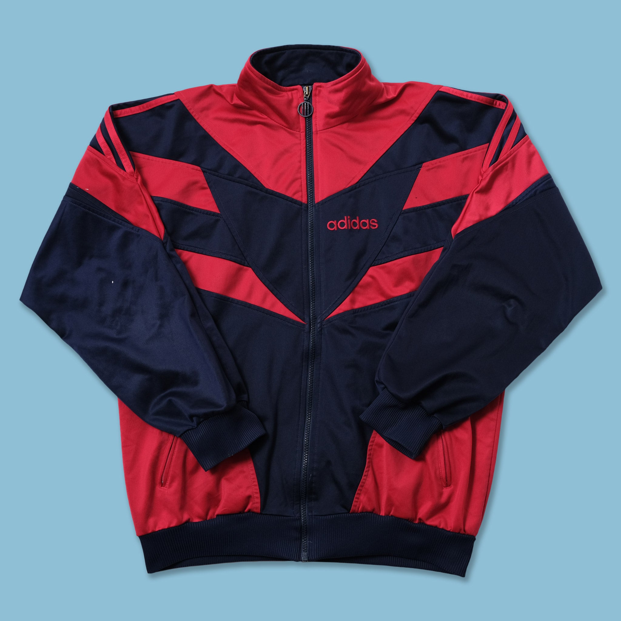 red and blue vintage adidas bomber jacket