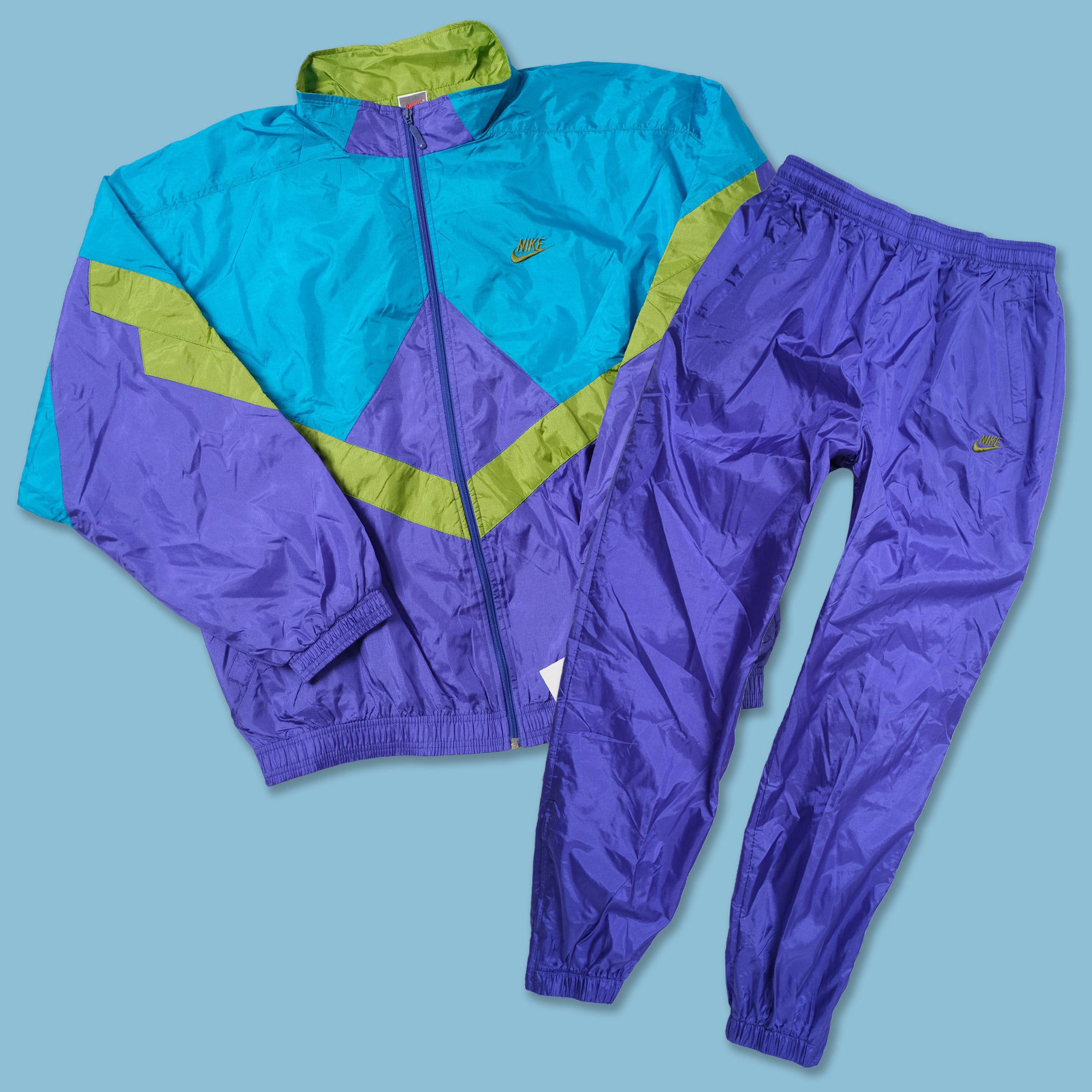 green and purple nike tracksuit