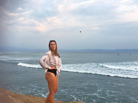 Jenn in Punta Mita headed for a surf