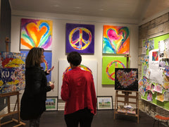 Sold a peace sign that night!  20% goes to Mark Arts.  