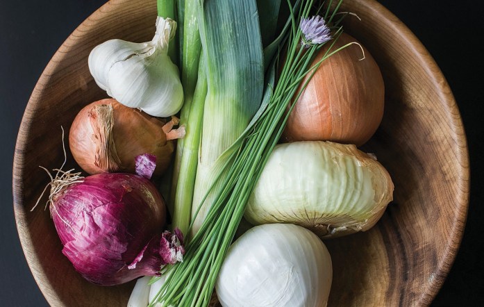 Chives, garlic and onions — common ingredients in human foods, these alliums can be toxic to dogs and especially cats.
