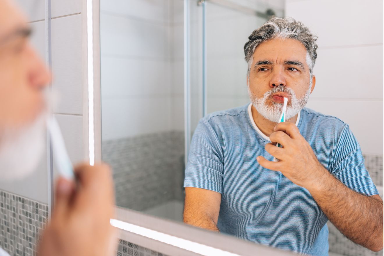 Man brushing teeth