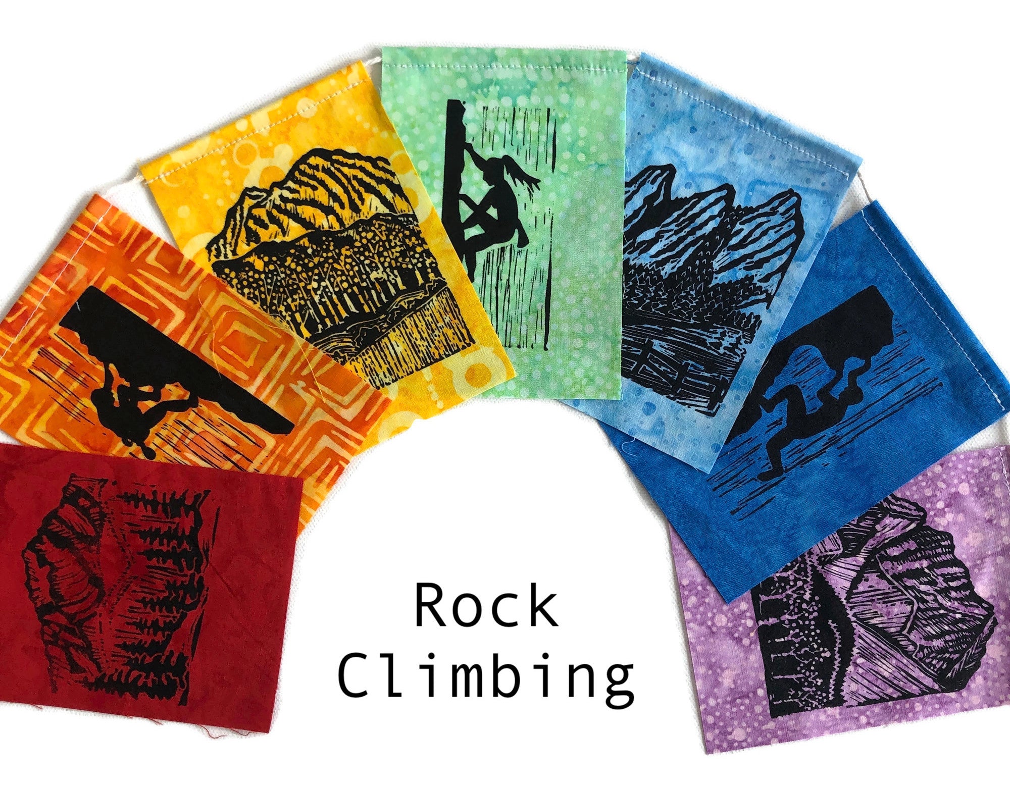 Small Flag Set with images of rock climbers handprinted on them