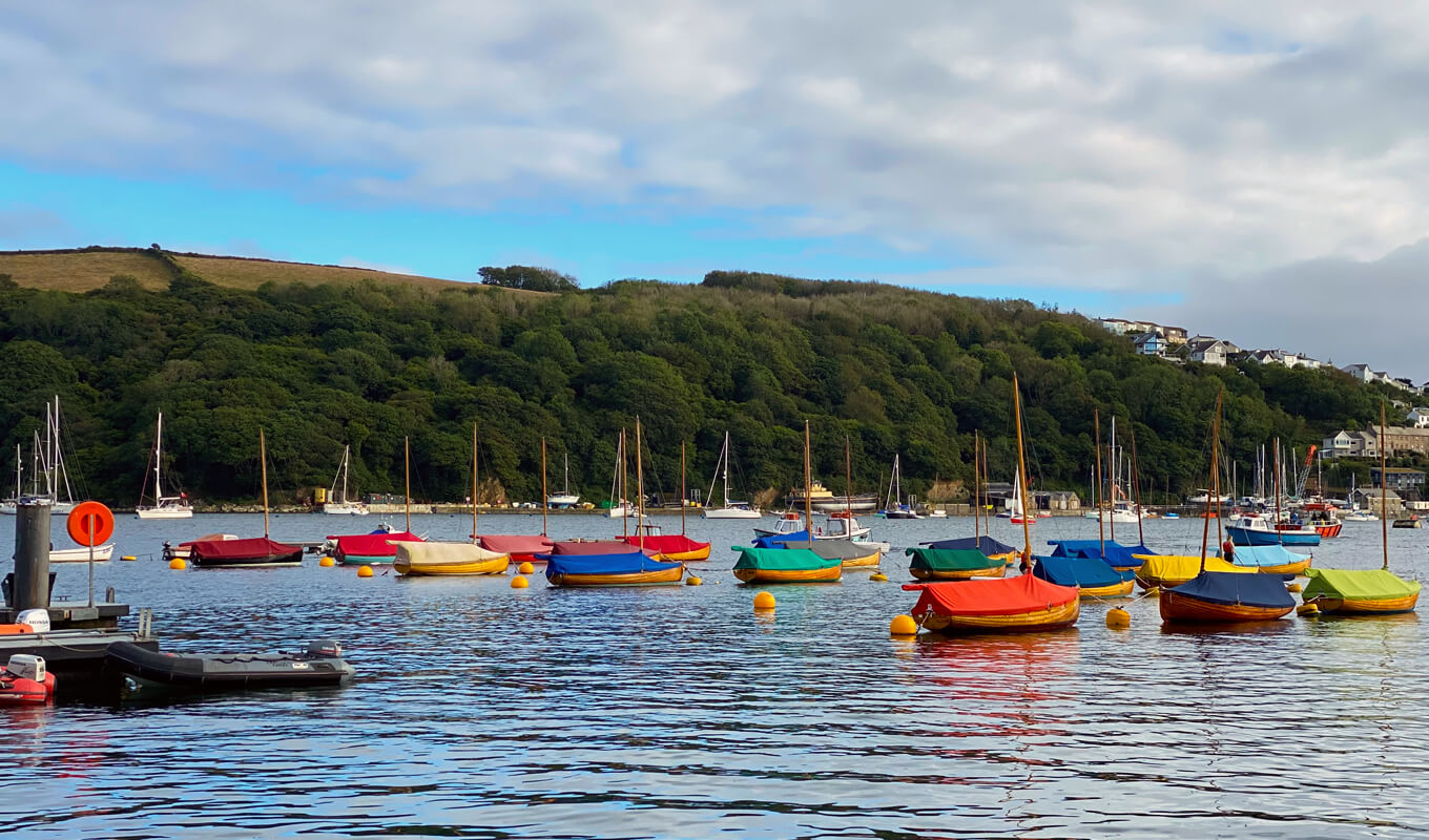 Boats with colorful cover in fowey river