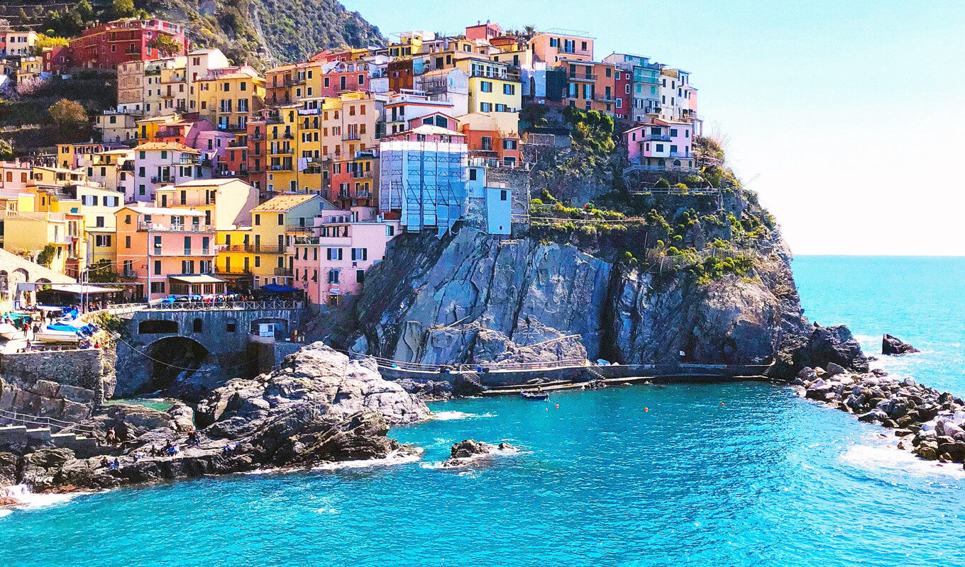 Colorful houses on mountain beside the sea, Cinque Terre, Italy