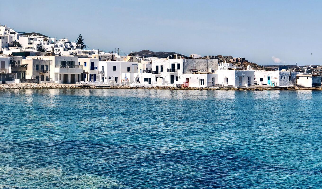 White concrete building near the sea, Paros, Greek Island